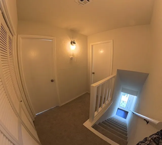 Upstairs hallway with laundry