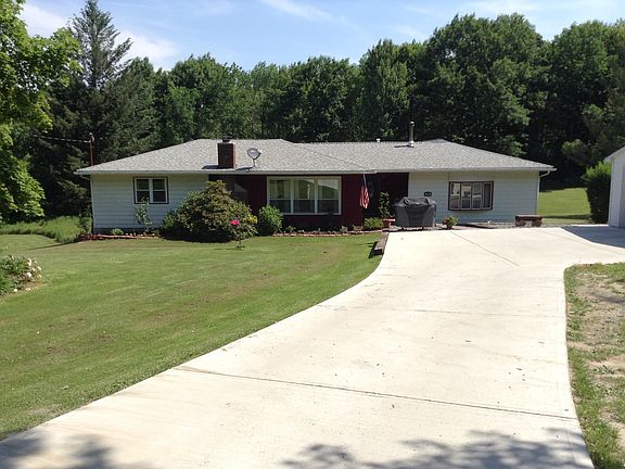Front w/ new driveway
