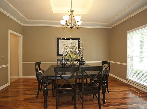 Formal Dining Room withwood floor.