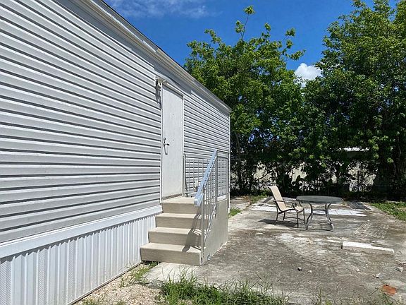 BACK OF MANUFACTURED HOME