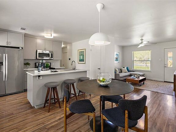 Open floor plan with pantry in kitchen