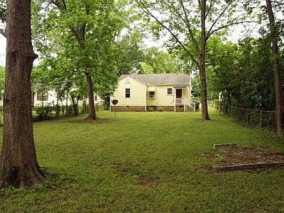 large fenced-in backyard. 