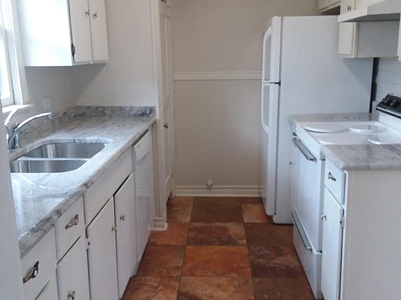 Kitchen with granite and appliances