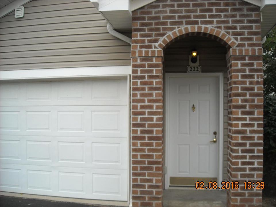 front entrance with garage