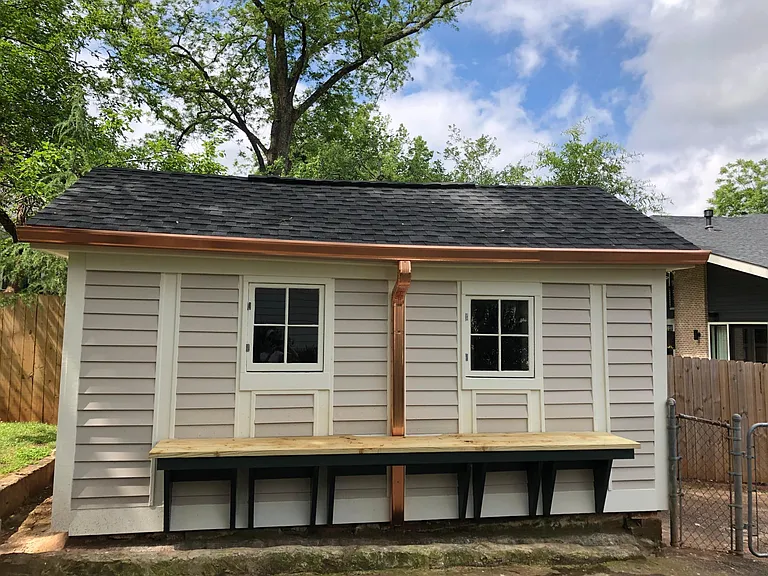 Newly renovated garden shed with potting bench