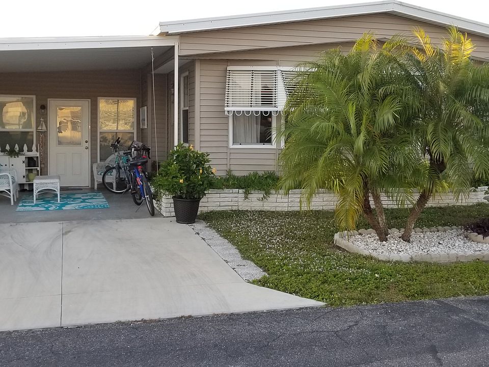 Front view and driveway.