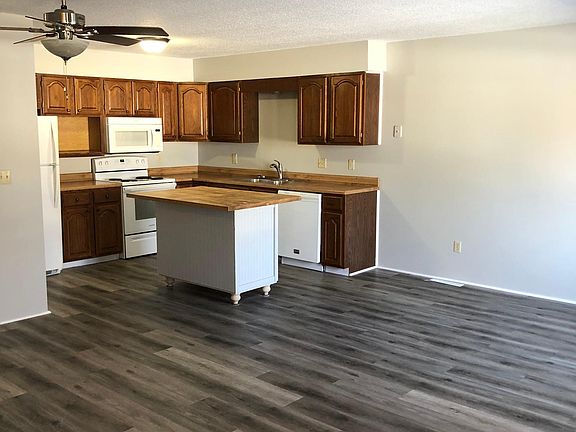 Spacious kitchen with center island and seamless open floor plan_perfect for cooking, entertaining, or relaxing with loved ones just steps away in the connected living area.