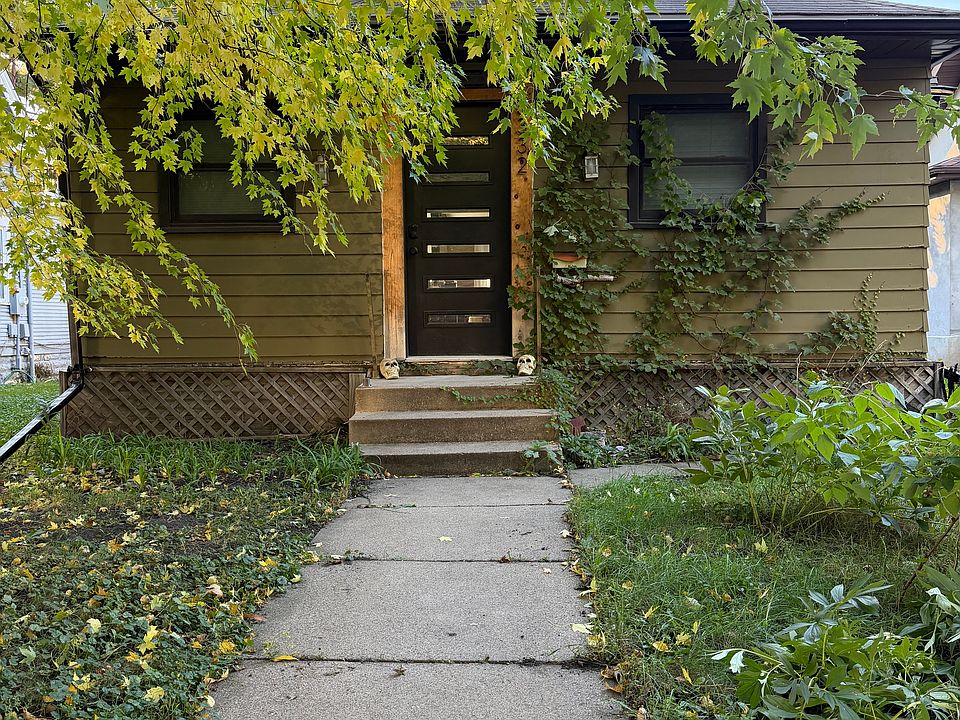 View from the sidewalk. Exterior lights.