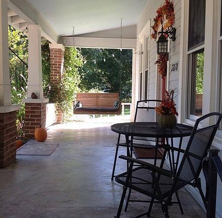 Southern Front Porch
						:
						Lovely spot for morning coffee or an after work cocktail while the birds chirp