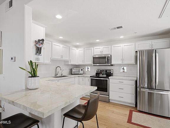 5th image of 9455 E RAINTREE Drive #1036