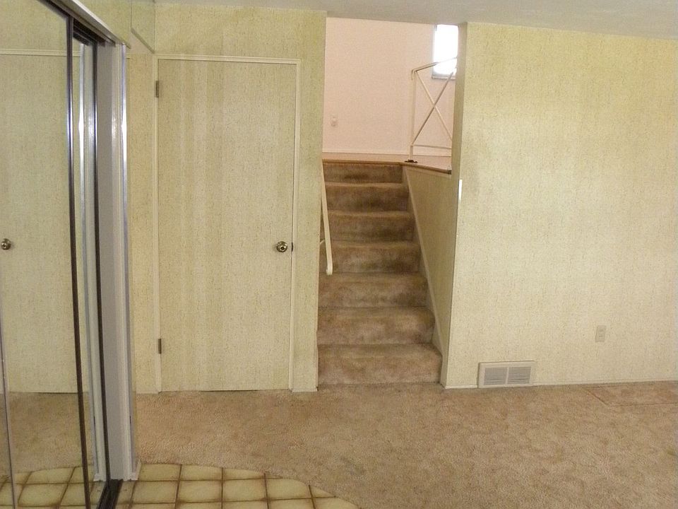 Entry (Ceramic tile and Mirrored Closet Doors)