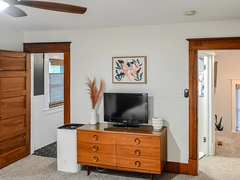 Left door leads to bath, right door to hallway