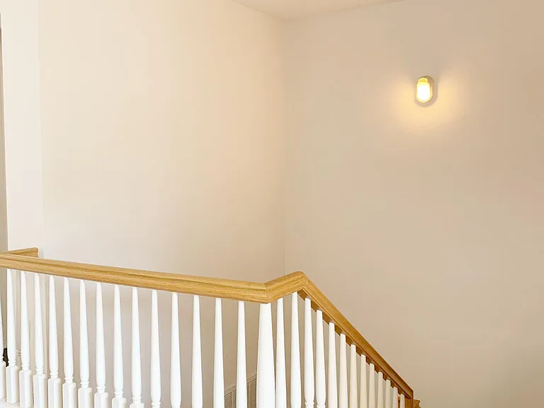 Stairs to bedrooms and office