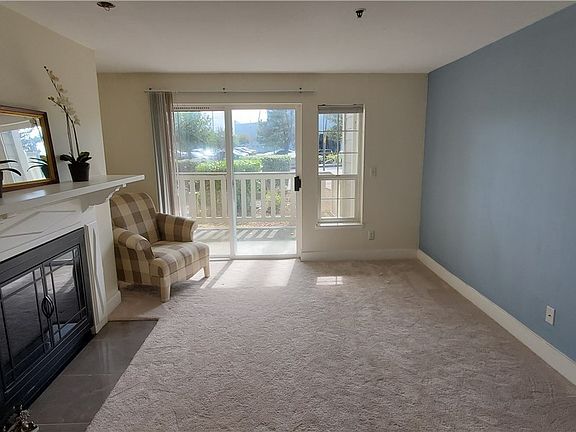 Slider access to covered porch with storage closet.