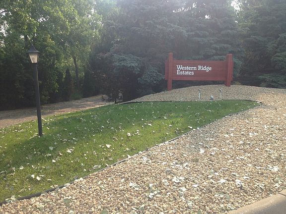 Mature trees welcoming you home.