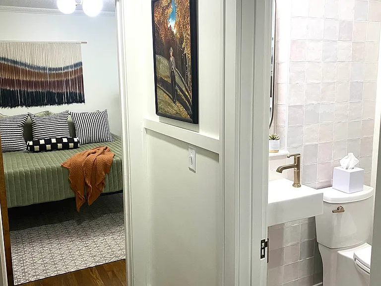 Full bathroom with walk in shower is steps away from main floor bedroom.