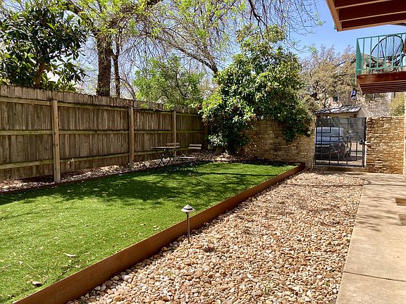Common courtyard looking back toward entrance gate and parking.