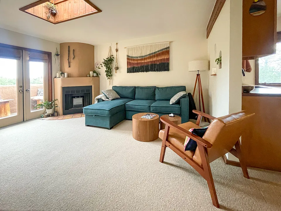 The space is designed to feel cozy and spacious, making use of the light and natural elements