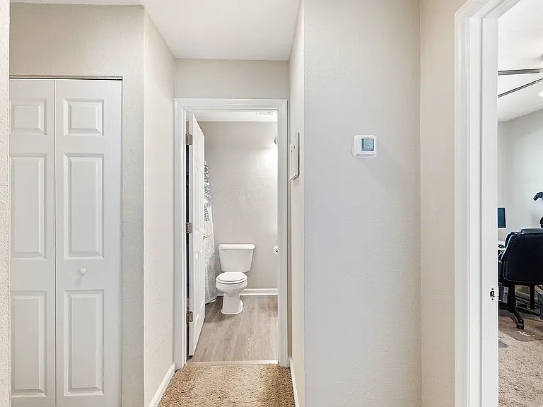 Upstairs hallway and closet *NOTE: floors have been updated with new laminate flooring, not pictured*