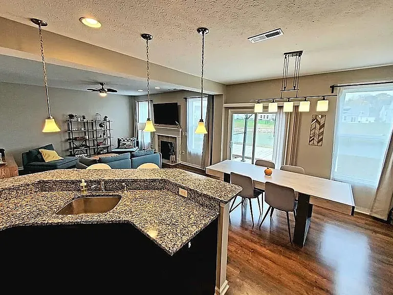 Kitchen looking out to living and dining room