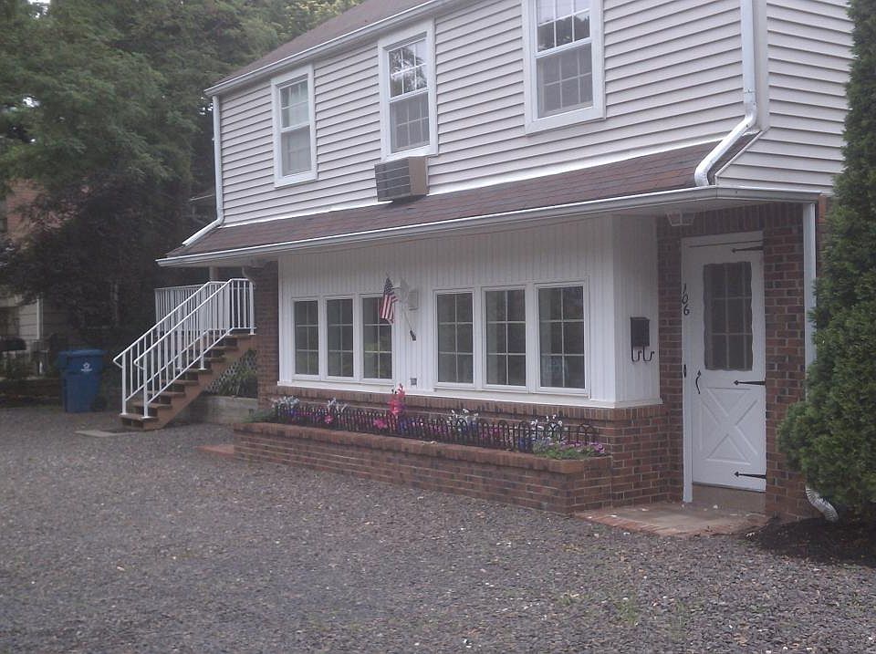 Entrance in ground floor (door on right), stairs lead to 2nd floor apartment