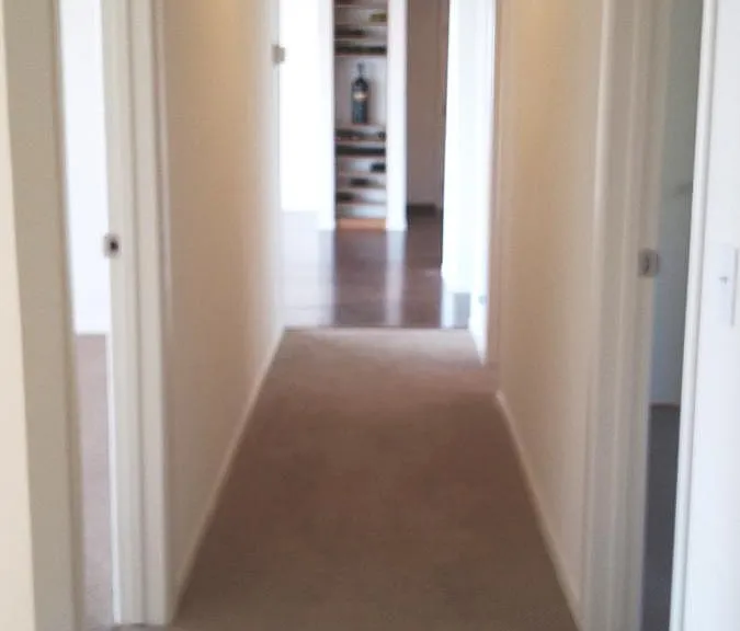 Hallway to Bedroom Suites