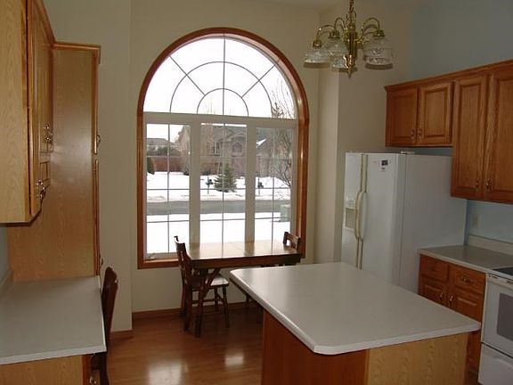 Great Kitchen with large window, eating area and lots of counter space.  There is also a past trough window to dining area