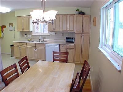 Totally remodeled kitchen with tons of cabinet space and crown molding