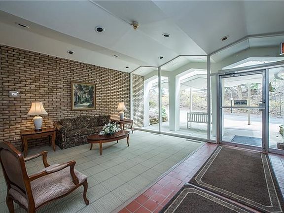 The bright, welcoming lobby is a cozy spot to meet and chat with neighbors or just relax while waiting on guests.