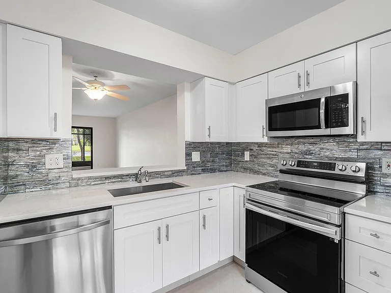 7290 Kinghurst Dr #106 — Photo 4