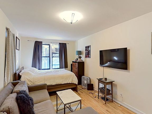5th image of 310 E 12th St APT 1A