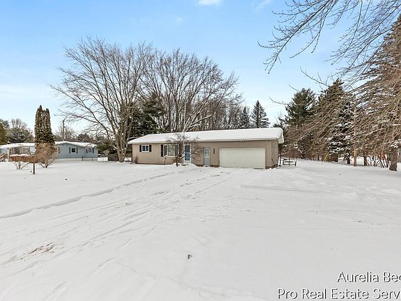 3rd image of 225 Eleven Mile Rd NW