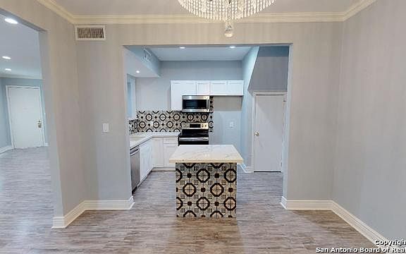 5th image of 7707 Broadway St
