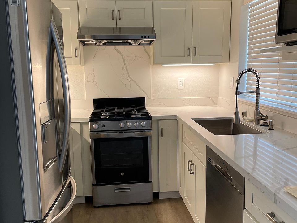 Kitchen with all new appliances and quartz counter tops