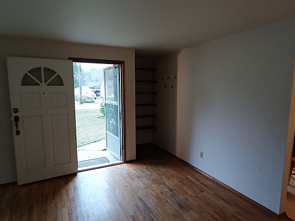 The front door and accompanying shoe closet