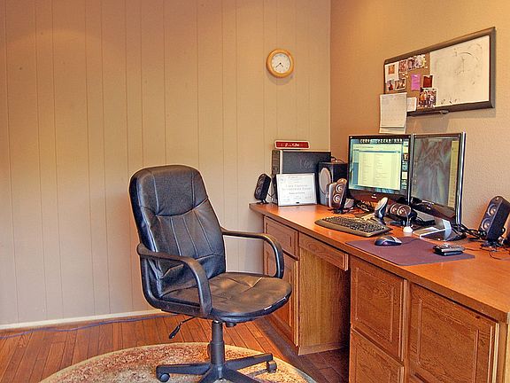 Privare office with built-in desk.