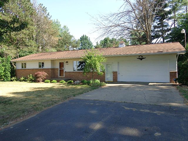 BULLOCK CREEK SCHOOLS!! Affordable one owner home with two car attached garage and a full basement. Finished recreation room, work shop and plenty of storage in the basement. Private, wooded one acre lot. Patio and Shed. Central Air. Security System.  Great floor plan! Well maintained. Convenient location, a short drive to Midland, Freeland and Hemlock. This home has so much to offer!!