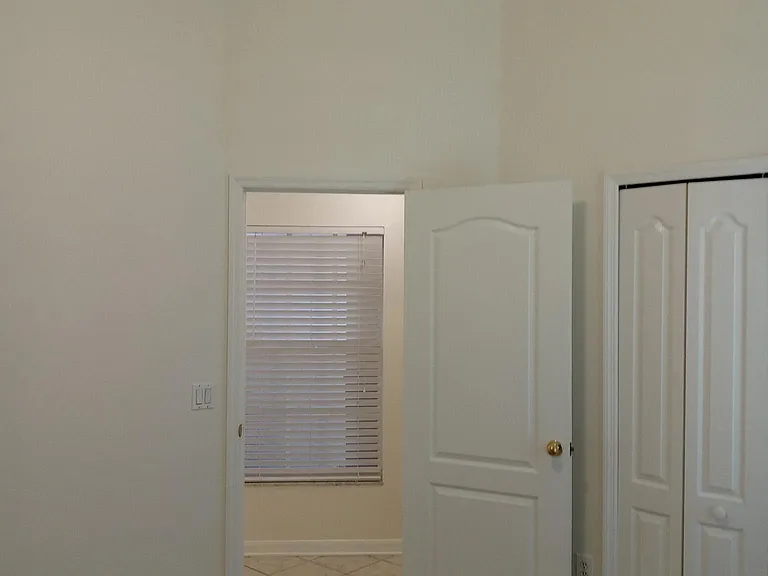 Smallest bedroom view to hallway. Large closet to the right.