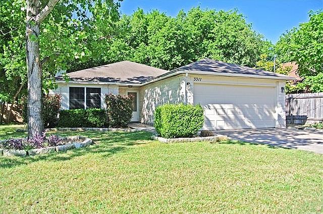 Welcome Home to 3311 Blumie Street in South Austin.