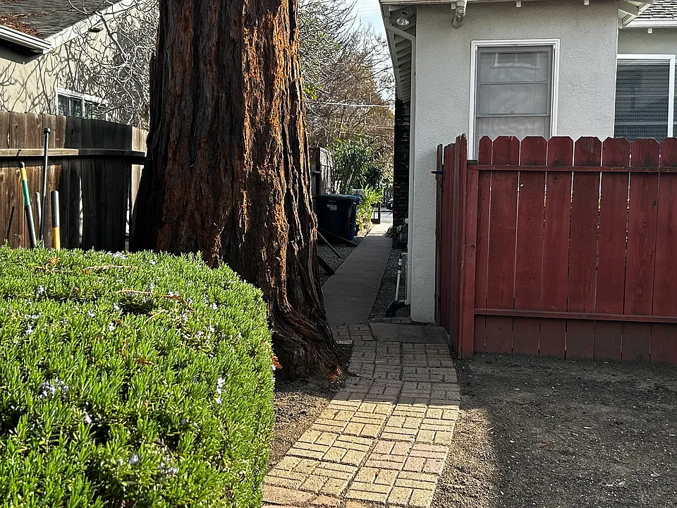 side yard access to the front door to this unit