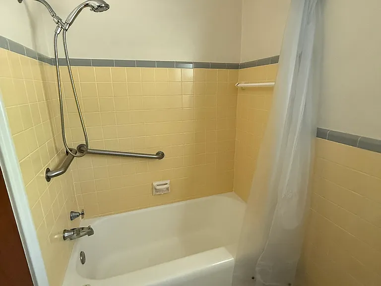 Hall Bath has tub