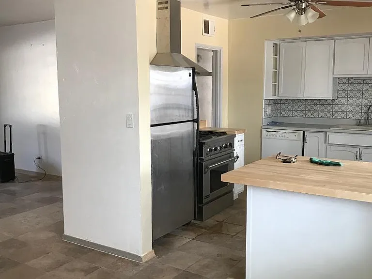 View of kitchen from dining area.