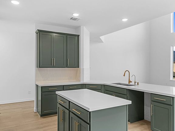Kitchen. Sample product photo. Actual exterior and interior selections may vary by homesite. Photo m