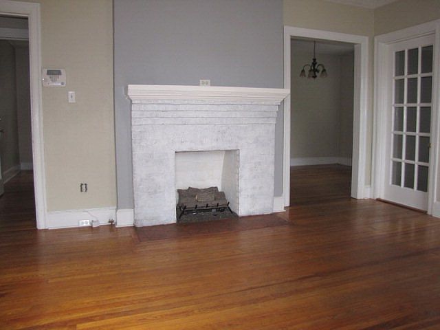 Living room, with gas fireplace & hardwood floors