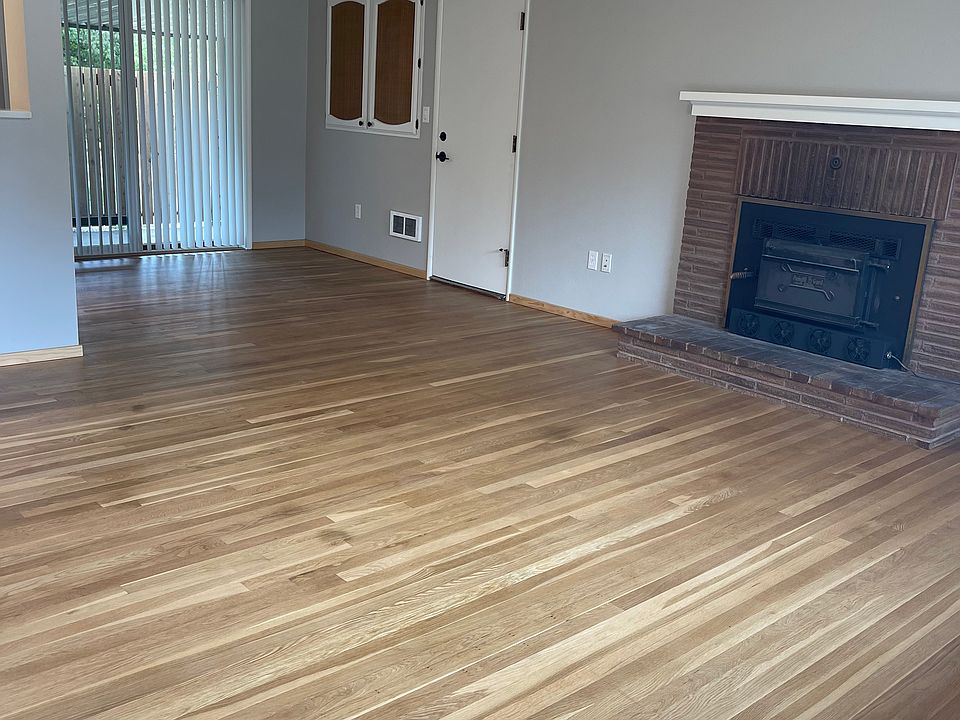 living room with wood fire place