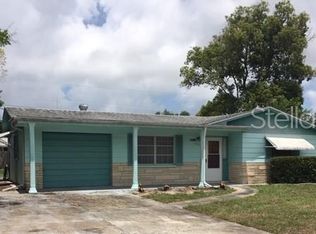 1243 Honor Dr, Holiday, FL 34690