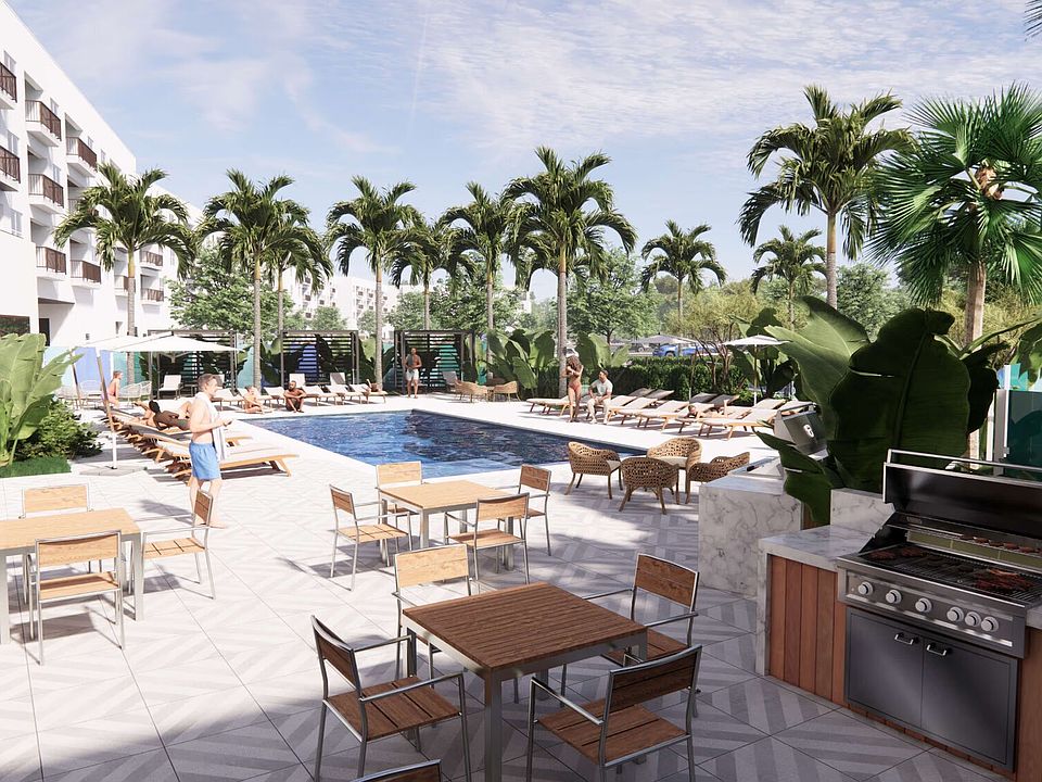 Grilling area with pool in the background