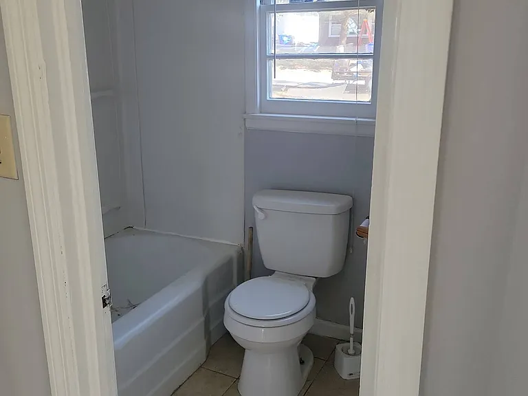 Hall bathroom, with tub/shower combo, and 18 inch vanity