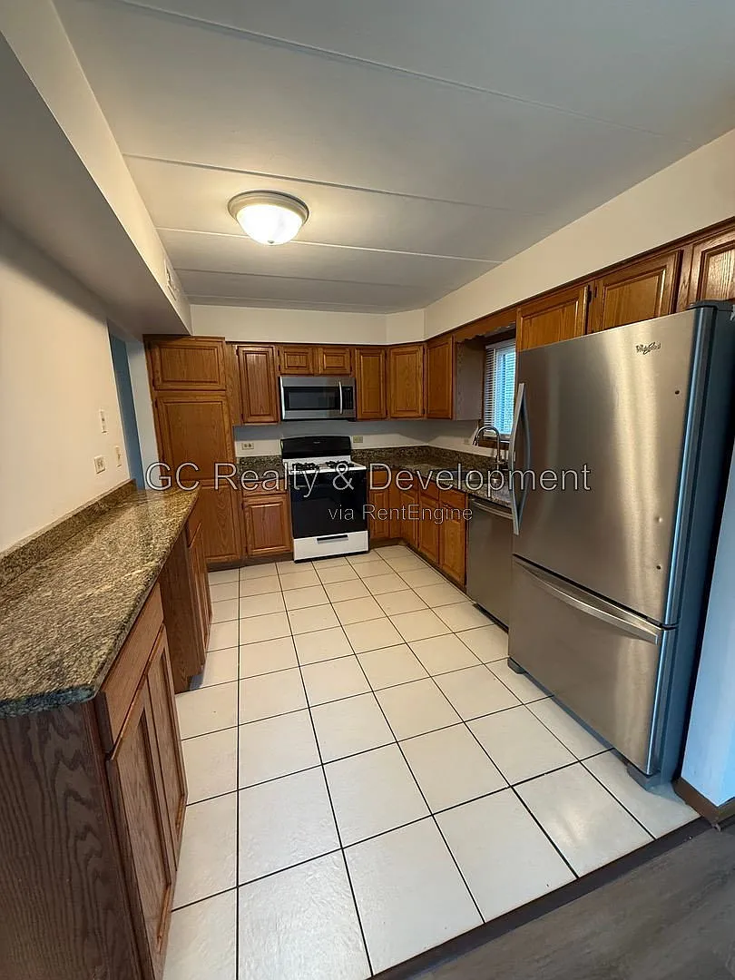 14810 Kenton Ave — Photo 2