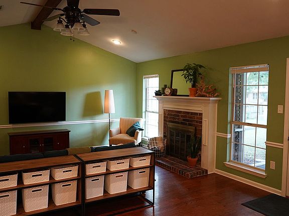 Fireplace, windows to porch